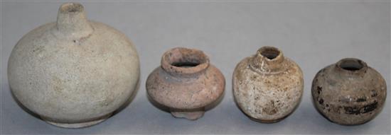 Four South East Asian pottery jarlets, c.300 AD, largest 6.5cm